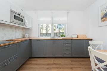 Фото номера Апартаменты с 2 спальнями с видом на сад (6 взрослых) Апартаменты Apartamenty Apartinfo - Blue Side Family г. Гданьск 15