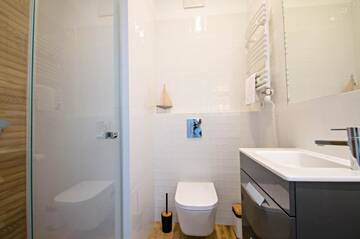 Фото номера Three-Bedroom Apartment - Wypoczynkowa 34A Апартаменты Grand Apartments - Neptun Park. г. Гданьск 17
