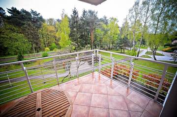 Фото номера Апартаменты с 2 спальнями и балконом - Wypoczynkowa 10A Апартаменты Grand Apartments - Neptun Park. г. Гданьск 3