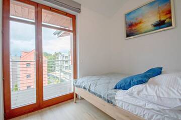 Фото номера Three-Bedroom Apartment - Wypoczynkowa 34A Апартаменты Grand Apartments - Neptun Park. г. Гданьск 11
