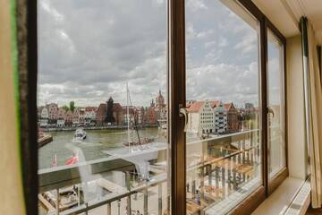 Фото номера Апартаменты с балконом Апартаменты SUITE Szafarnia Prime Location г. Гданьск 38