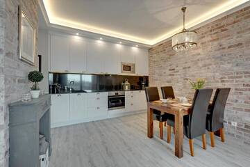 Фото номера Улучшенные апартаменты Апартаменты Blue Mandarin Riverside г. Гданьск 3