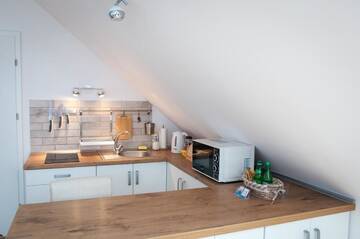 Фото номера Улучшенный номер-студио Апартаменты Pietrzak Apartments г. Гданьск 23