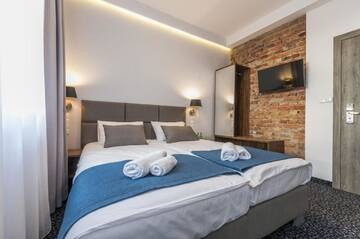 Фото номера Стандартный трехместный номер Апарт-отели Liberum Residence г. Гданьск 3