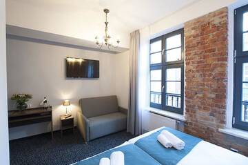 Фото номера Стандартный трехместный номер Апарт-отели Liberum Residence г. Гданьск 2