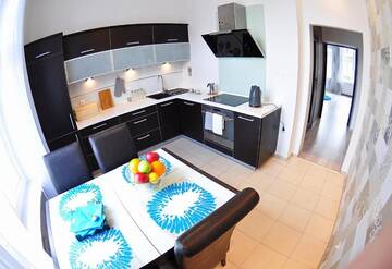 Фото номера Апартаменты с 1 спальней Апартаменты Long Street Apartment г. Гданьск 60
