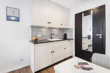 Фото номера Двухместный номер-студио Делюкс с 1 кроватью Апартаменты Mill Studio Apartments Gdansk г. Гданьск 7