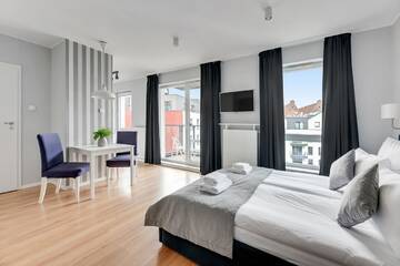 Фото номера Апартаменты с балконом Апартаменты Downtown Apartments Chmielna Park г. Гданьск 6