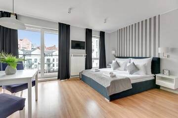 Фото номера Апартаменты с балконом Апартаменты Downtown Apartments Chmielna Park г. Гданьск 4