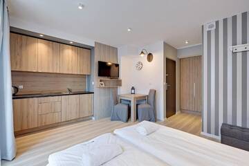 Фото номера Апартаменты-студио без парковки Апартаменты Apartamenty Apartinfo Chmielna Park г. Гданьск 4