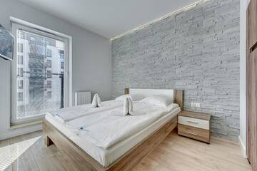Фото номера Апартаменты Делюкс с балконом и местом на парковке Апартаменты Apartamenty Apartinfo Chmielna Park г. Гданьск 4