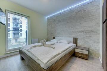 Фото номера Апартаменты Делюкс с балконом и местом на парковке Апартаменты Apartamenty Apartinfo Chmielna Park г. Гданьск 3