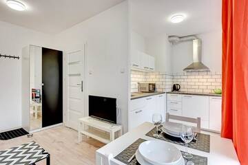 Фото номера Апартаменты с 1 спальней, балконом и парковкой Апартаменты Apartamenty Apartinfo Chmielna Park г. Гданьск 6