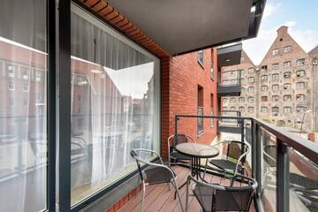 Фото номера Роскошные апартаменты с балконом и парковкой Апартаменты Apartamenty Apartinfo Chmielna Park г. Гданьск 4
