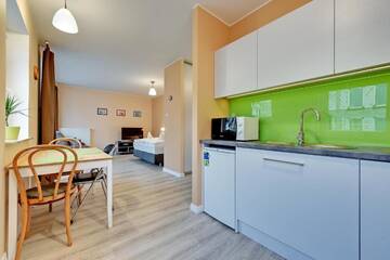 Фото номера Апартаменты-студио с балконом и парковкой Апартаменты Apartamenty Apartinfo Chmielna Park г. Гданьск 6