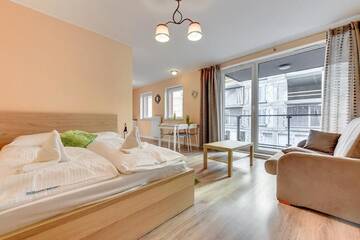 Фото номера Апартаменты-студио с балконом, без парковки Апартаменты Apartamenty Apartinfo Chmielna Park г. Гданьск 2