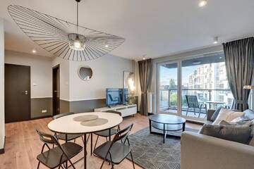 Фото номера Апартаменты Делюкс с балконом и местом на парковке Апартаменты Apartamenty Apartinfo Chmielna Park г. Гданьск 3