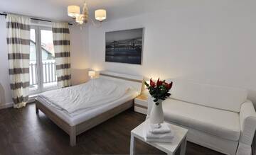 Фото номера Номер с кроватью размера «king-size» и балконом Апартаменты Arenaapartments г. Гданьск 8