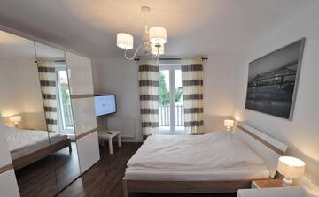 Фото номера Номер с кроватью размера «king-size» и балконом Апартаменты Arenaapartments г. Гданьск 16