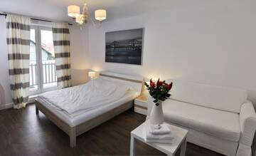 Фото номера Номер с кроватью размера «king-size» и балконом Апартаменты Arenaapartments г. Гданьск 17