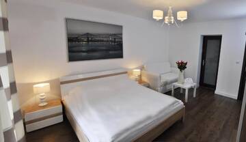 Фото номера Номер с кроватью размера «king-size» и балконом Апартаменты Arenaapartments г. Гданьск 19
