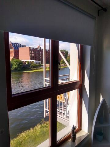 Фото номера Апартаменты Делюкс с видом на реку Хостелы WaterLane Island Hostel г. Гданьск 5