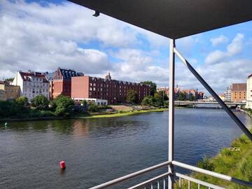 Фото номера Апартаменты Делюкс с видом на реку Хостелы WaterLane Island Hostel г. Гданьск 3