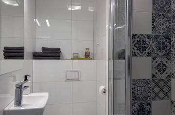 Фото номера Двухместный номер с 1 кроватью и балконом Проживание в семье INITIUM rooms - Obrońców Wybrzeża 4D г. Гданьск 12