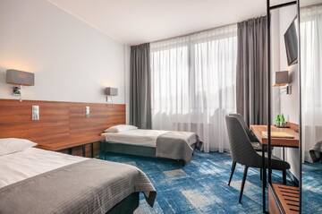 Фото номера Двухместный номер с 2 отдельными кроватями Отель Hotel Oliwski г. Гданьск 3